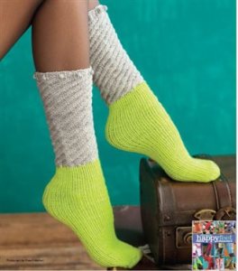 The "Do the Twist" tube socks pattern comes from the book "Happy Feet" by Cathy Carron, via Knitting Daily TV.