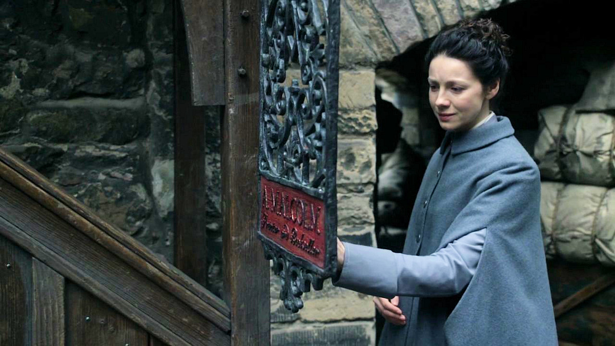 Claire arrives at A. Malcom, publisher.