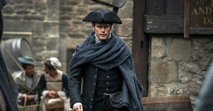 Jamie jauntily and stylishly heads to work.