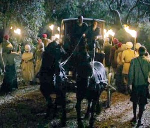 The horses stop, but still prance.