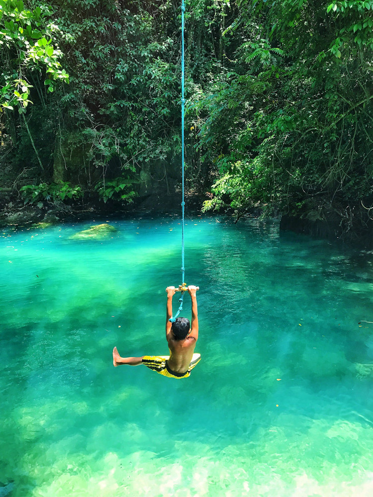 Boy on a rope swing