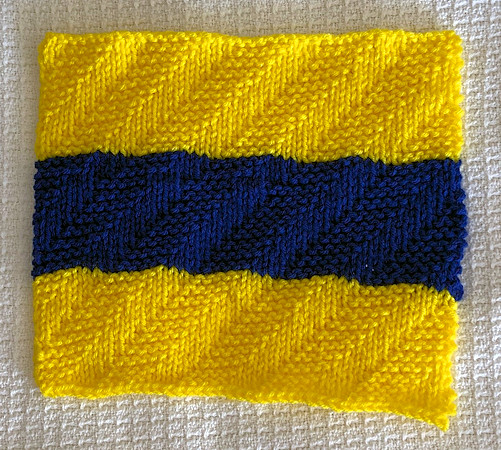 Delta (D) square is done in diagonal garter stitch.